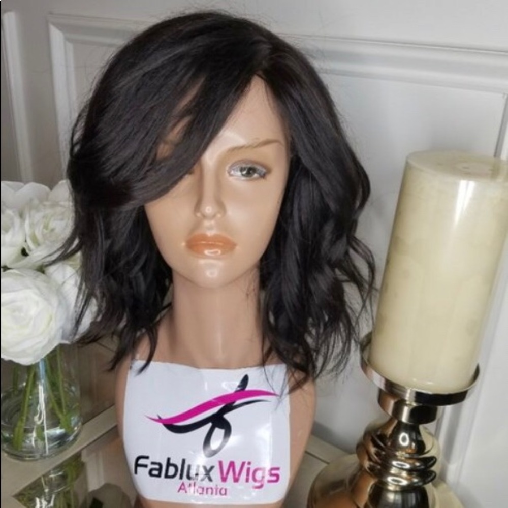 Fablux hand sewn 12” bob cut. Lace closure wig.